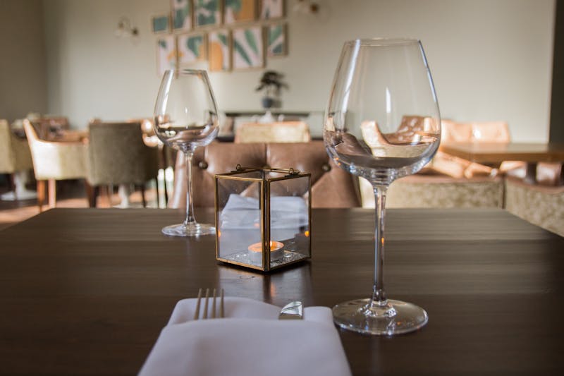 Warm and welcoming ambiance inside Pequod's pizza dining area